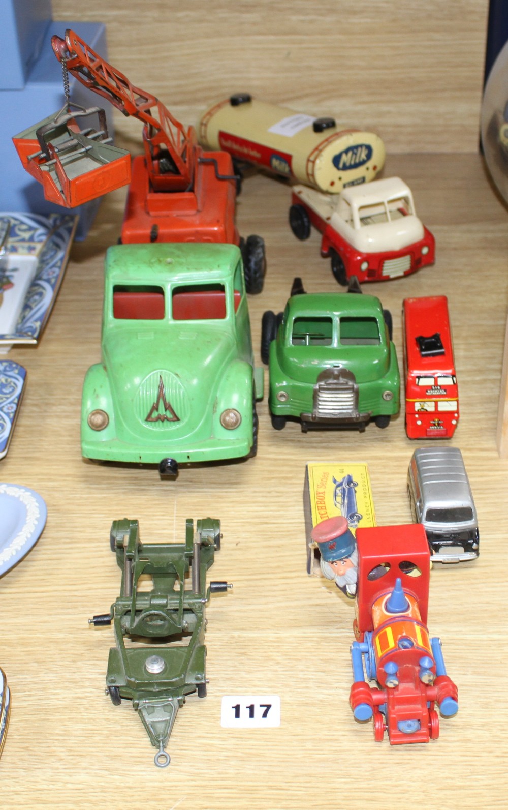 A group of assorted tinplate and diecast toys